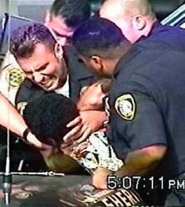 nice one super-cop. what a tough guy.